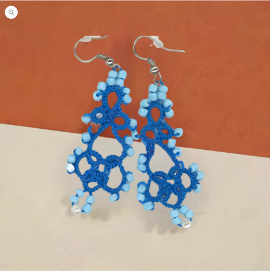 What sets Mita's handmade earrings apart?