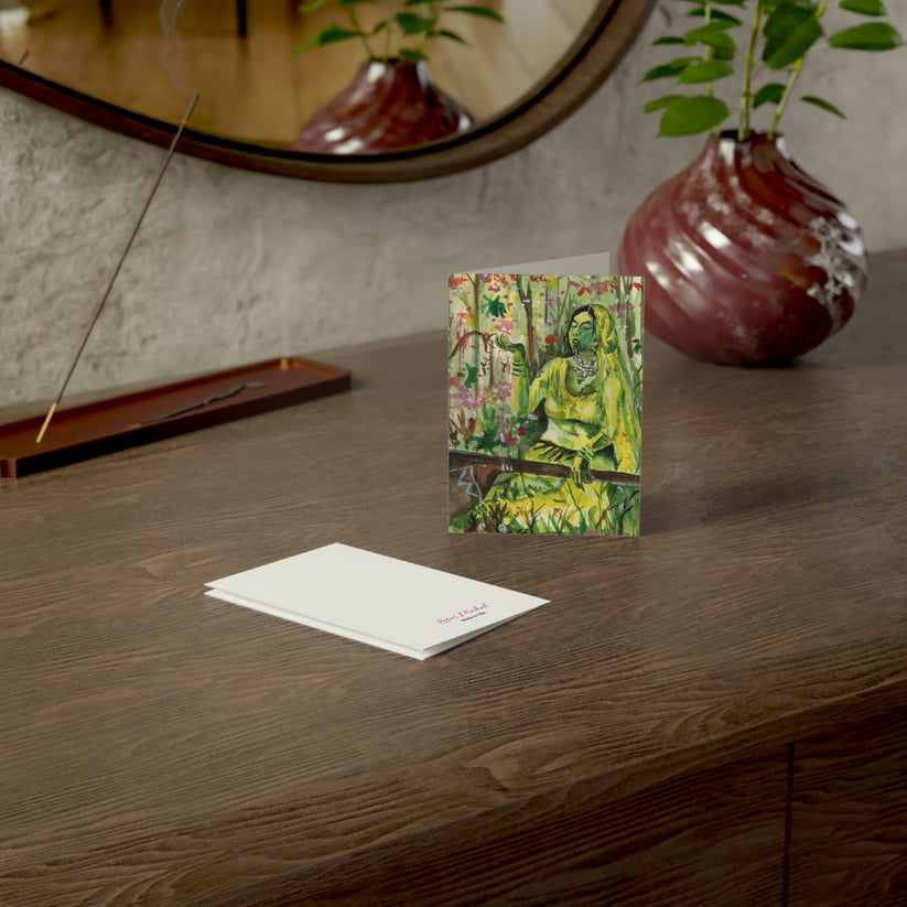 Picture of a greeting card made by Lotus Mahal called Basant Raga where a women is singing in the calling of the spring